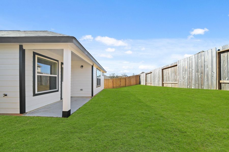 Front exterior of a new home in Hunter's Creek, Huntsville, TX, highlighting curb appeal (Image 11). Front exterior of a new home in Hunter's Creek, Huntsville, TX, highlighting curb appeal (Image 11).