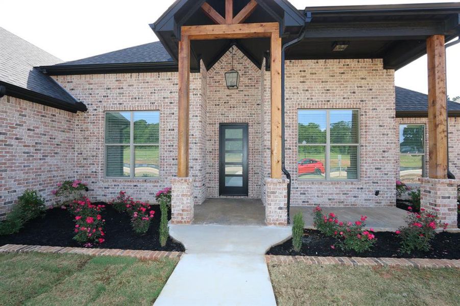 Front exterior of a new home in , Tyler, TX, highlighting curb appeal (Image 2). Front exterior of a new home in , Tyler, TX, highlighting curb appeal (Image 2).