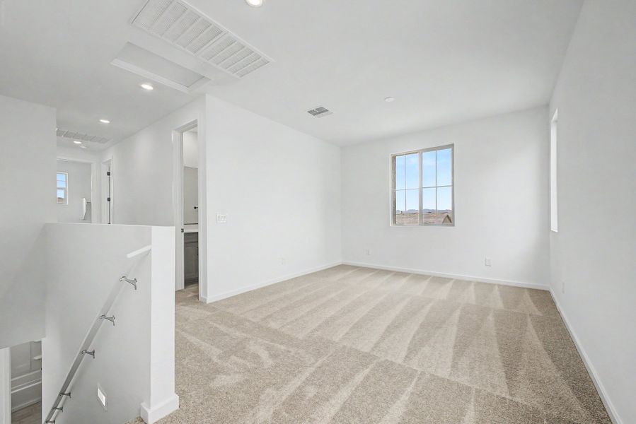 Spacious, unfurnished interior of a new home in Mason Ranch II, Surprise (Image 9).