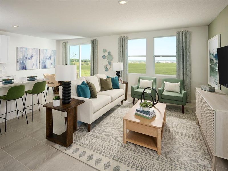 Furnished interior view inside a new home in The Grove at Stuart Crossing - Classic Series, Bartow (Image 3).
