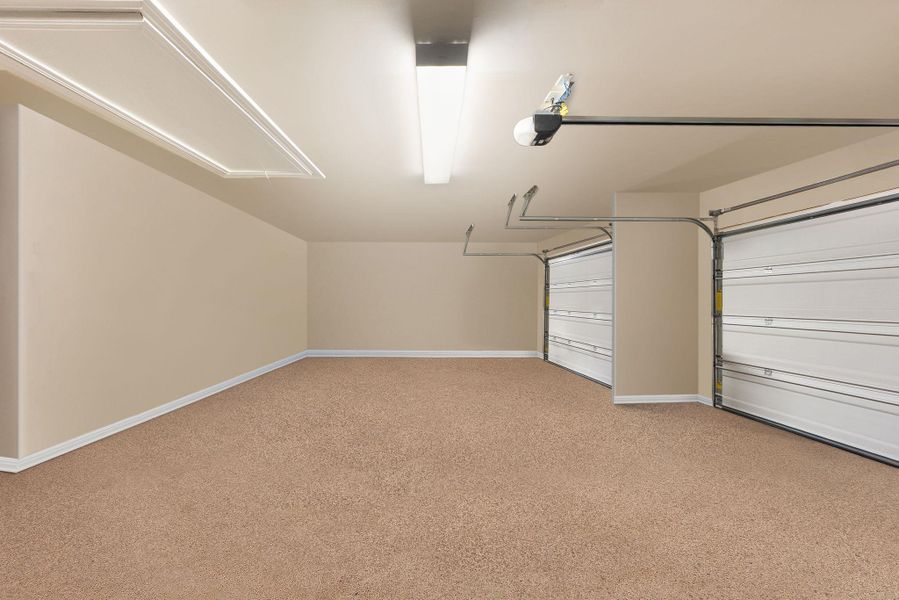 3-car garage with epoxy flooring. 3-car garage with epoxy flooring.