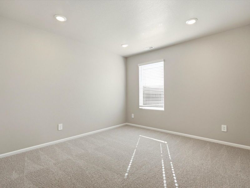 Spacious, unfurnished interior of a new home in Buffalo Highlands: The Flora Collection, Commerce City (Image 13).