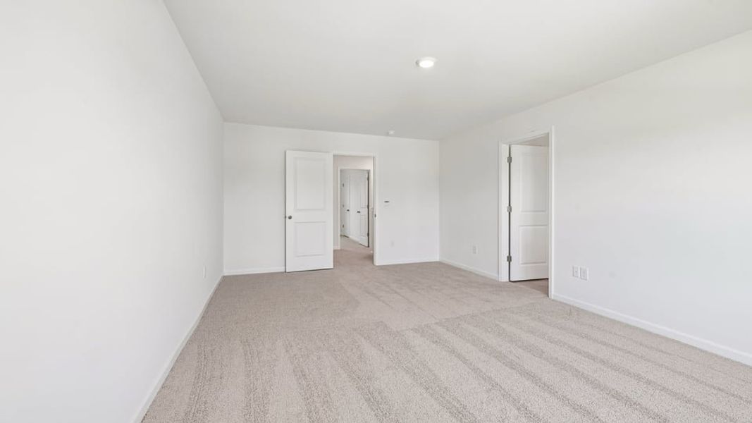 Spacious, unfurnished interior of a new home in Shahbain Reserve, Raeford (Image 40). Spacious, unfurnished interior of a new home in Shahbain Reserve, Raeford (Image 40).