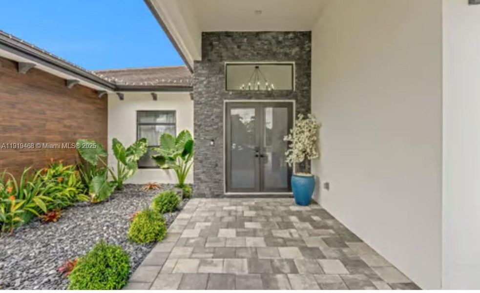 Exterior details and patio area of a home in , Miami (Image 2).