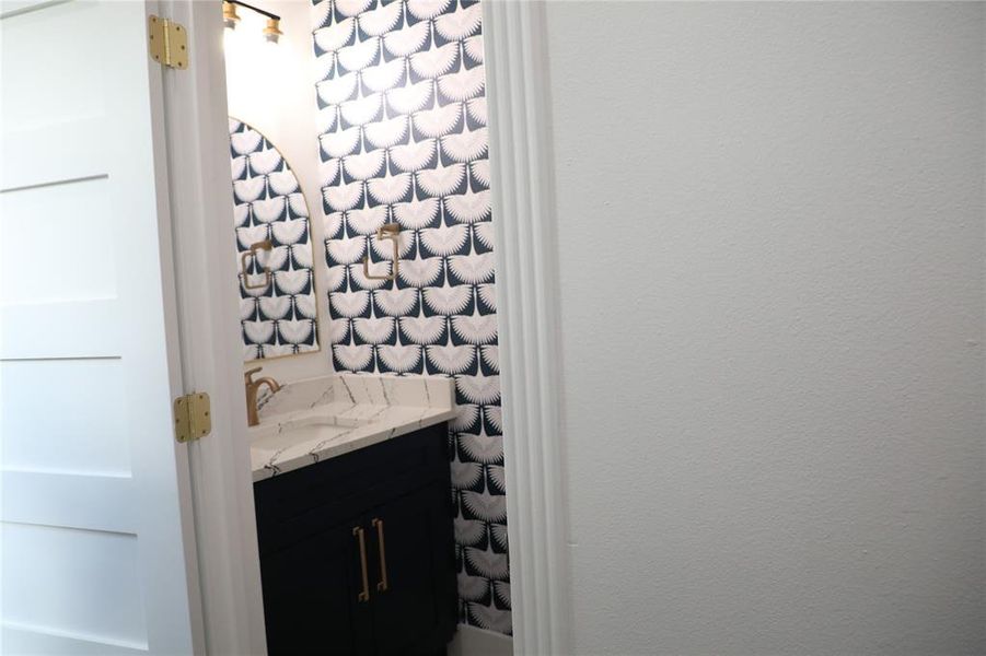 Powder room downstairs by the garage and mud room.