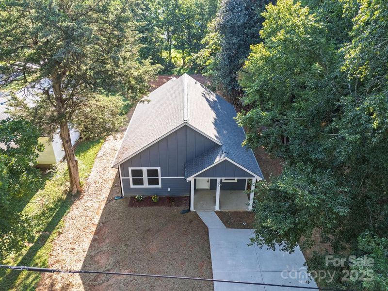 Front exterior of a new home in , Statesville, NC, highlighting curb appeal (Image 27). Front exterior of a new home in , Statesville, NC, highlighting curb appeal (Image 27).