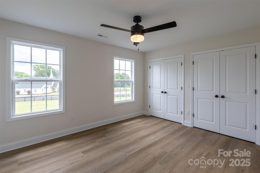 upstairs bedroom that has a private bath