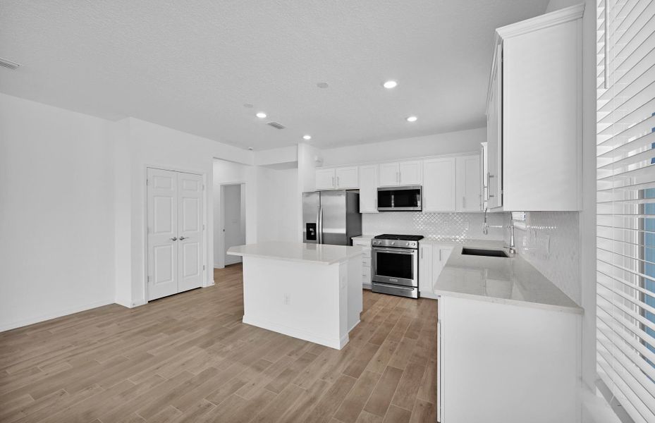 Furnished interior view inside a new home in Del Webb Wildlight, Yulee (Image 5).