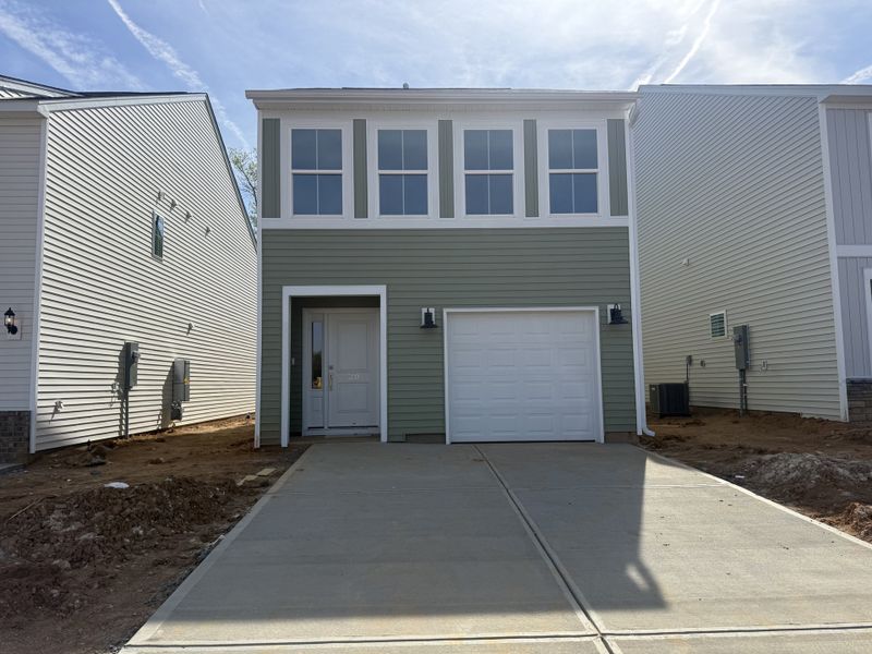 Front exterior of a new home in Laurinton Farms, Hopkins, SC, highlighting curb appeal (Image 1). Front exterior of a new home in Laurinton Farms, Hopkins, SC, highlighting curb appeal (Image 1).