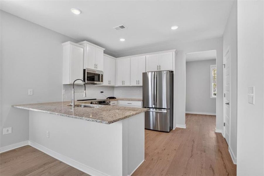 Furnished interior view inside a new home in , Fayetteville (Image 6).
