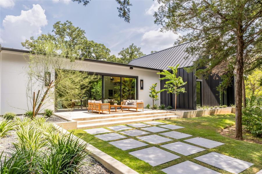 Front exterior of a new home in , College Station, TX, highlighting curb appeal (Image 2).