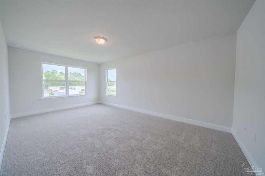 Representative unfurnished interior of a home built from the 1648 by Adams Homes in Parkland Place, Pace (Image 16).