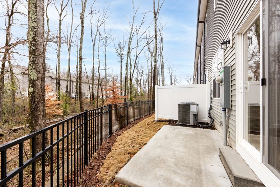 Exterior details and patio area of a home in Fifteen 15 Cannon, Charlotte (Image 21).