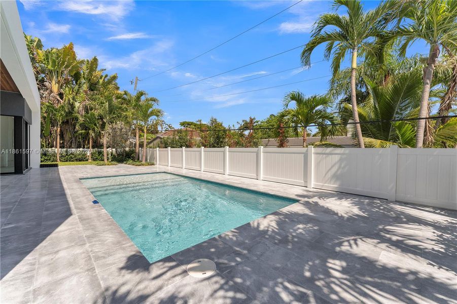 Front exterior of a new home in , Pompano Beach, FL, highlighting curb appeal (Image 19).