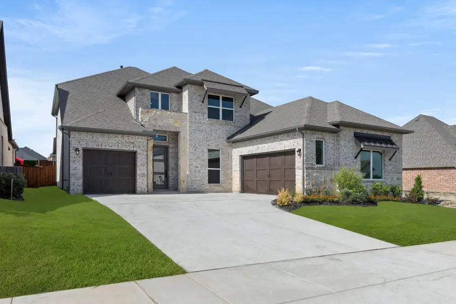 Representative exterior photo of a completed home built from the Edward- 70 ft Home Site by Rockwell Homes in Nelson Lake Estates, Rockwall, TX (Image 2). Representative exterior photo of a completed home built from the Edward- 70 ft Home Site by Rockwell Homes in Nelson Lake Estates, Rockwall, TX (Image 2).