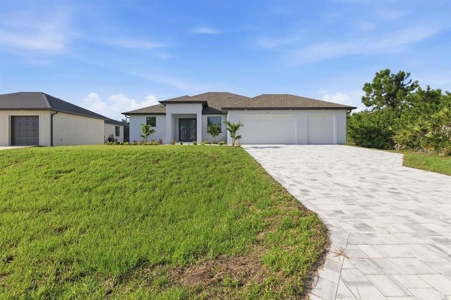 Front exterior of a new home in , Englewood, FL, highlighting curb appeal (Image 22).