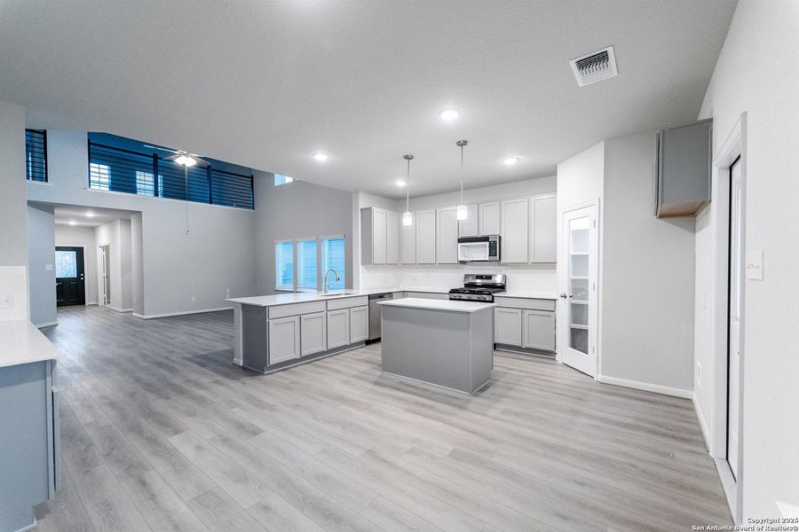 Furnished interior view inside a new home in Hennersby Hollow, San Antonio (Image 4).