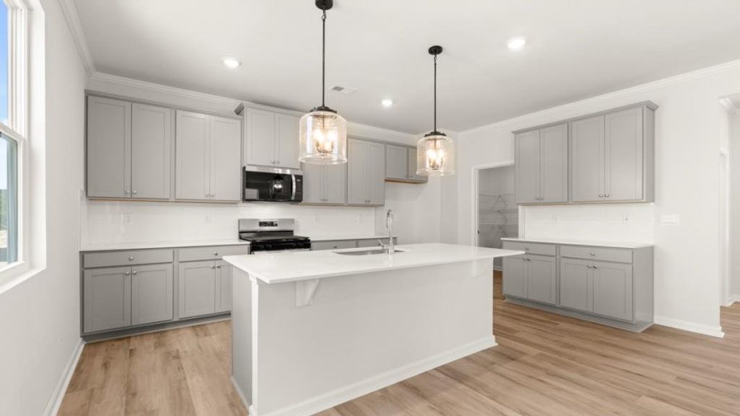 Furnished interior view inside a new home in Fairway 17 at Mirror Lake, Villa Rica (Image 11).