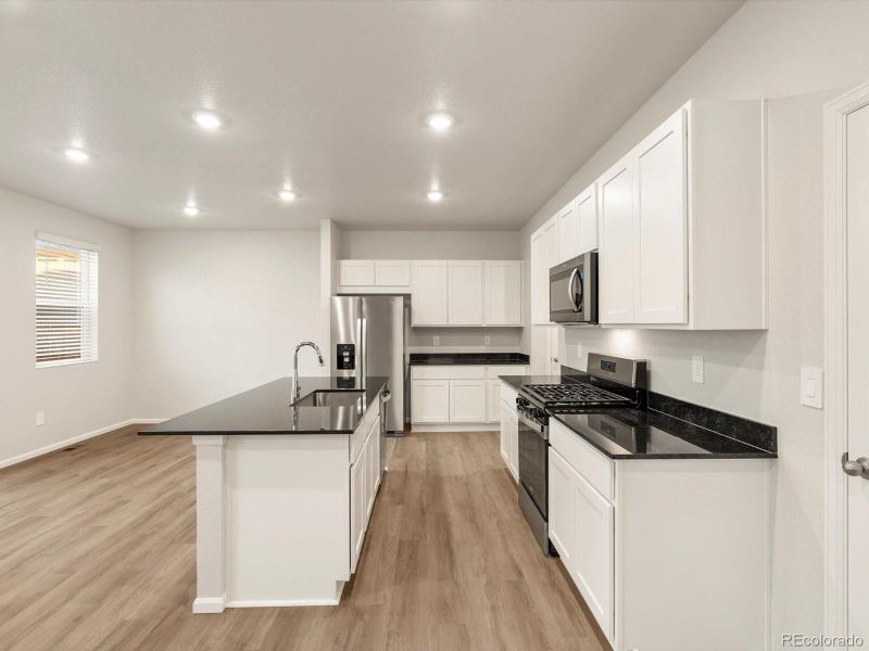 Furnished interior view inside a new home in Lake Bluff, Greeley (Image 5).