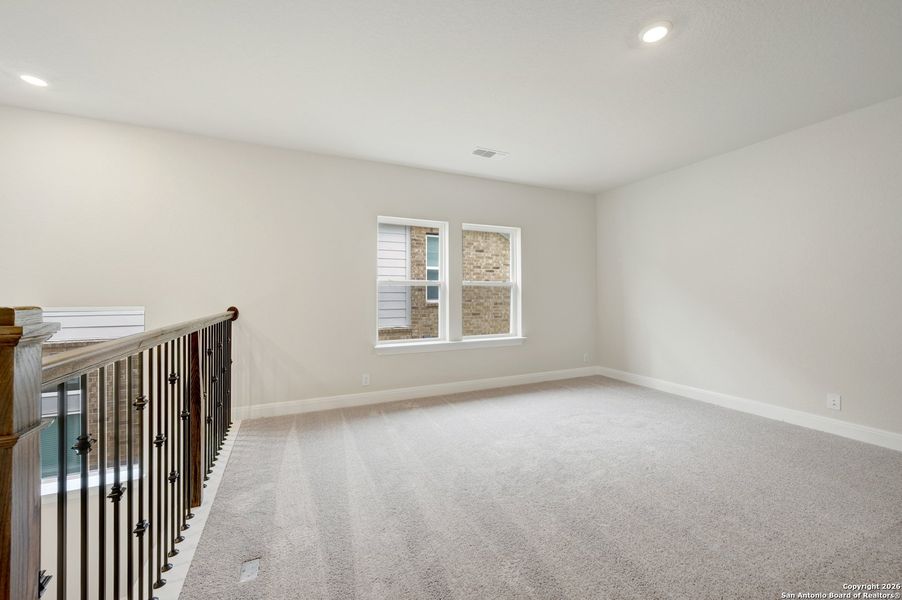 Spacious, unfurnished interior of a new home in Windsong - Reserve Series, Boerne (Image 33).