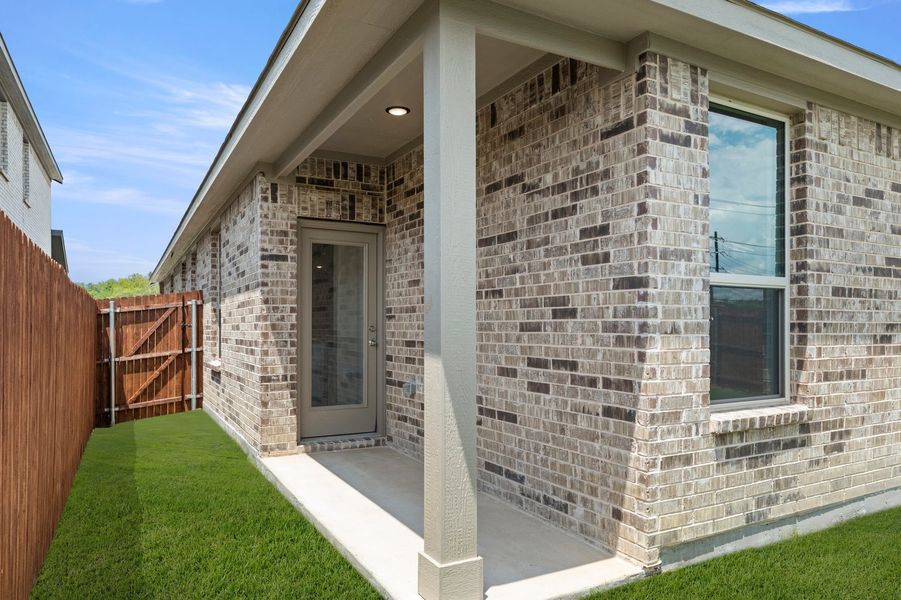 Front exterior of a new home in Churchill, Anna, TX, highlighting curb appeal (Image 21). Front exterior of a new home in Churchill, Anna, TX, highlighting curb appeal (Image 21).