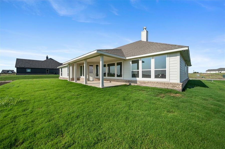 Front exterior of a new home in Fairview Meadows, New Fairview, TX, highlighting curb appeal (Image 19). Front exterior of a new home in Fairview Meadows, New Fairview, TX, highlighting curb appeal (Image 19).