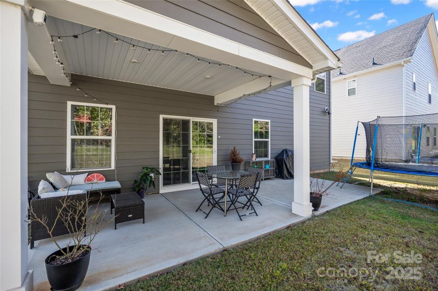 Partially covered back patio Partially covered back patio