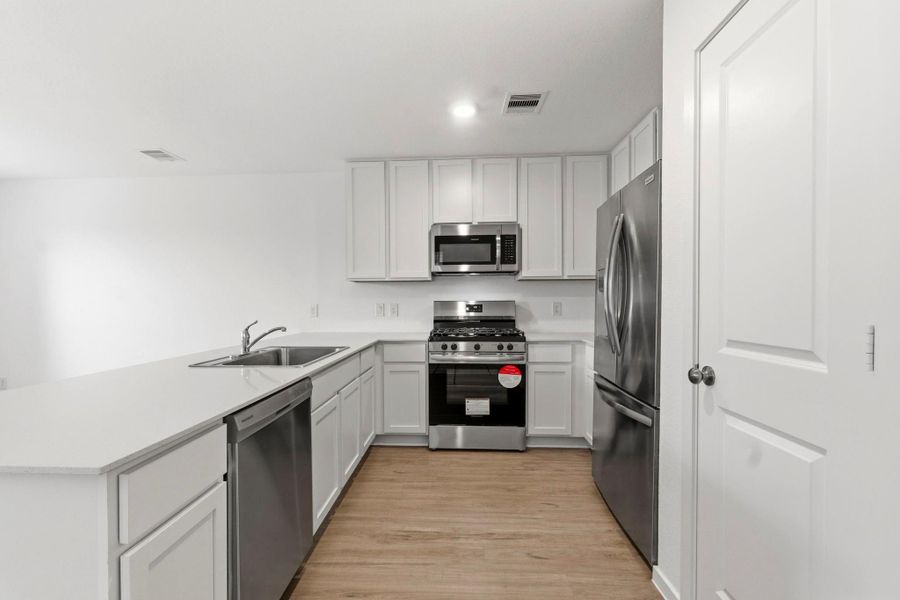 Furnished interior view inside a new home in Tavola, New Caney (Image 5).