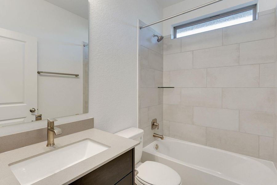 Furnished interior view inside a new home in The Porch at Du Pre, Buda (Image 6).