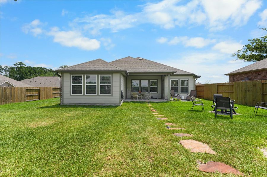 Front exterior of a new home in Wedgewood Forest, Conroe, TX, highlighting curb appeal (Image 2). Front exterior of a new home in Wedgewood Forest, Conroe, TX, highlighting curb appeal (Image 2).