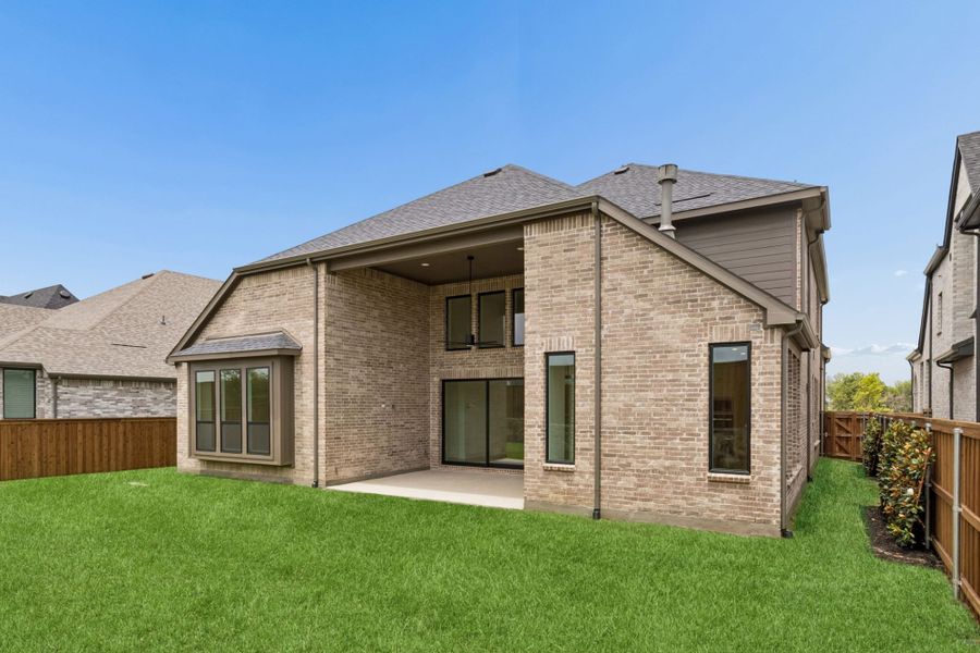 Exterior details and patio area of a home in Mosaic – 70′ Lots, Celina (Image 27).
