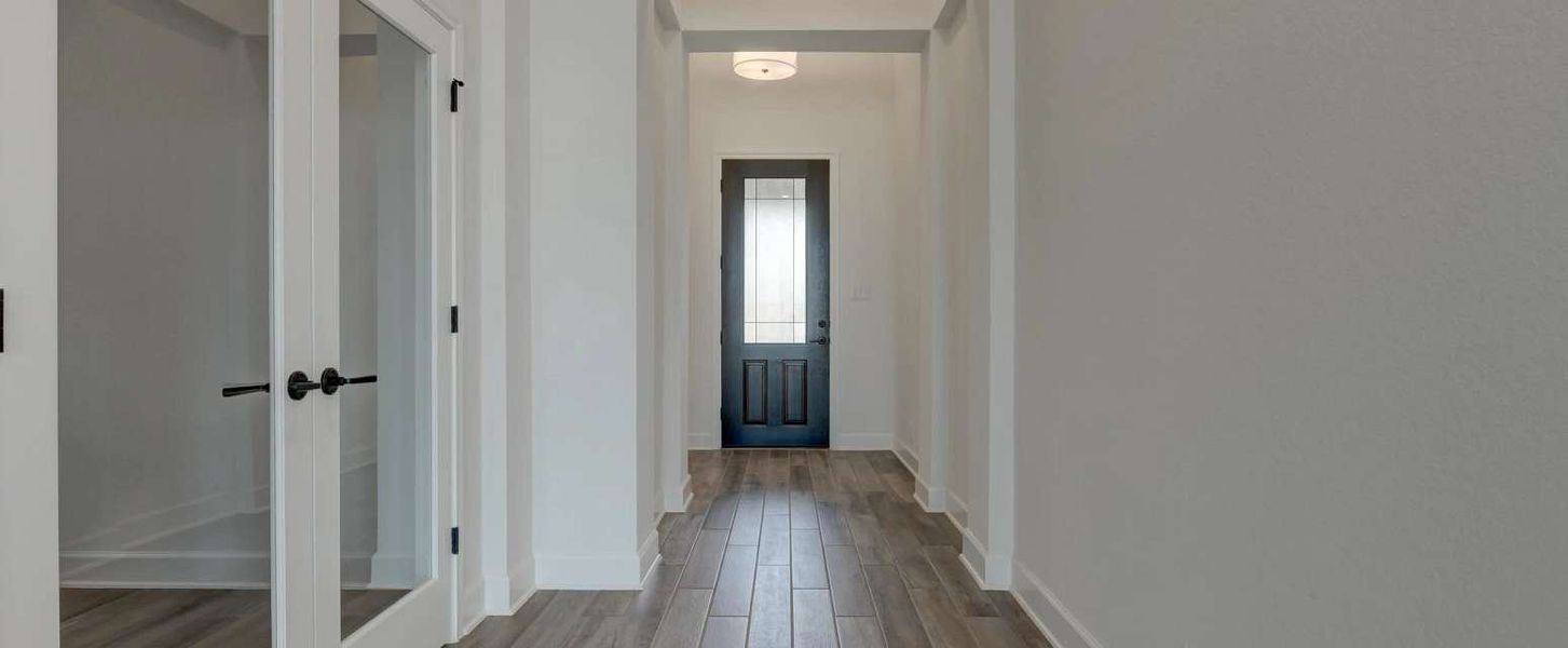 Image 17 representing the Ellington by Ashton Woods in Megan's Landing 70's, Castroville, TX.