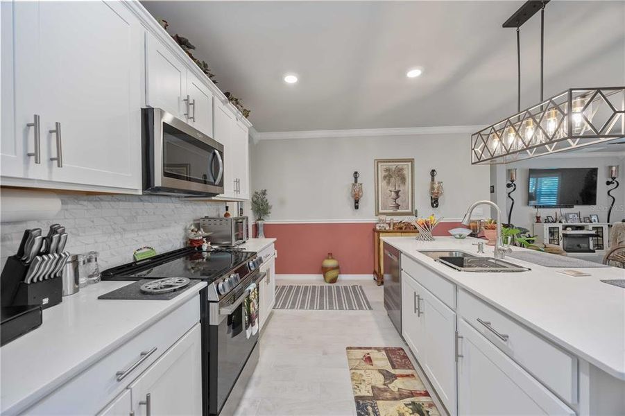 Furnished interior view inside a new home in Burnt Store Village, Punta Gorda (Image 50).