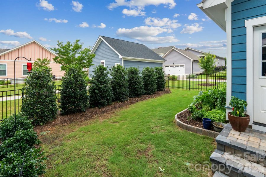 Exterior details and patio area of a home in Riverwalk, Rock Hill (Image 24).