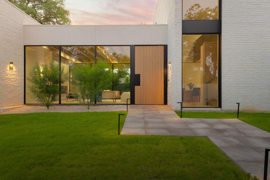 Doorway to property with a yard