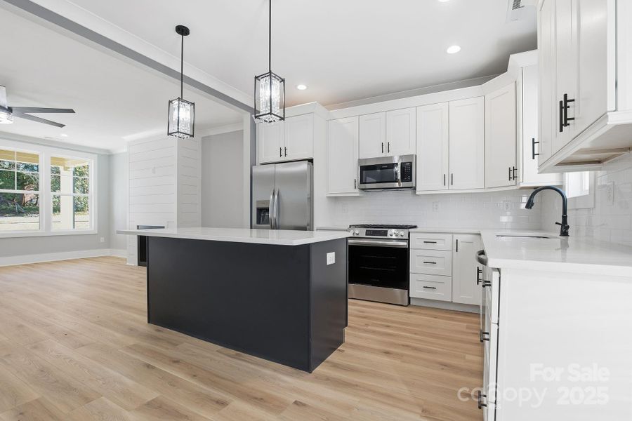 Furnished interior view inside a new home in , Belmont (Image 6).