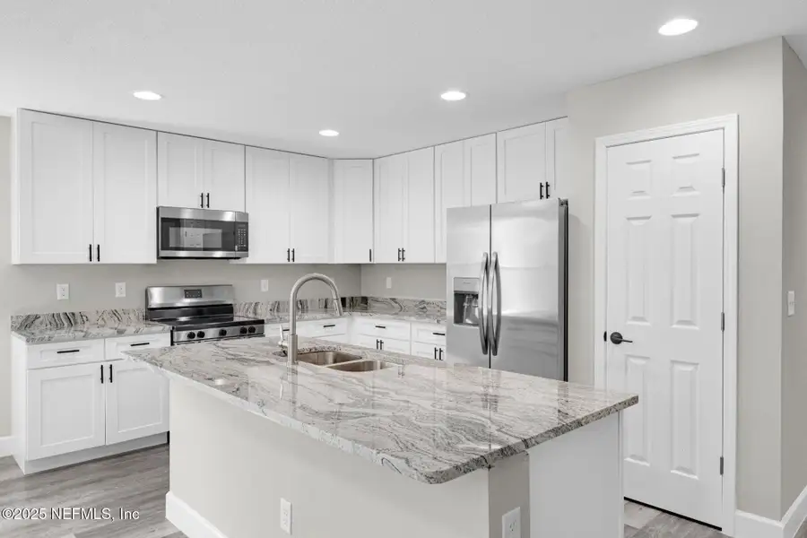 Furnished interior view inside a new home in , Jacksonville (Image 12).