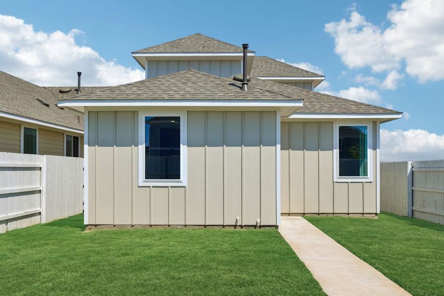 Exterior details and patio area of a home in Harvest Ridge, Elgin (Image 4).