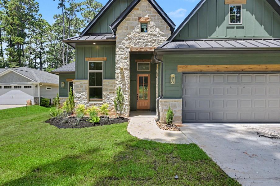 Front exterior of a new home in , Willis, TX, highlighting curb appeal (Image 27).