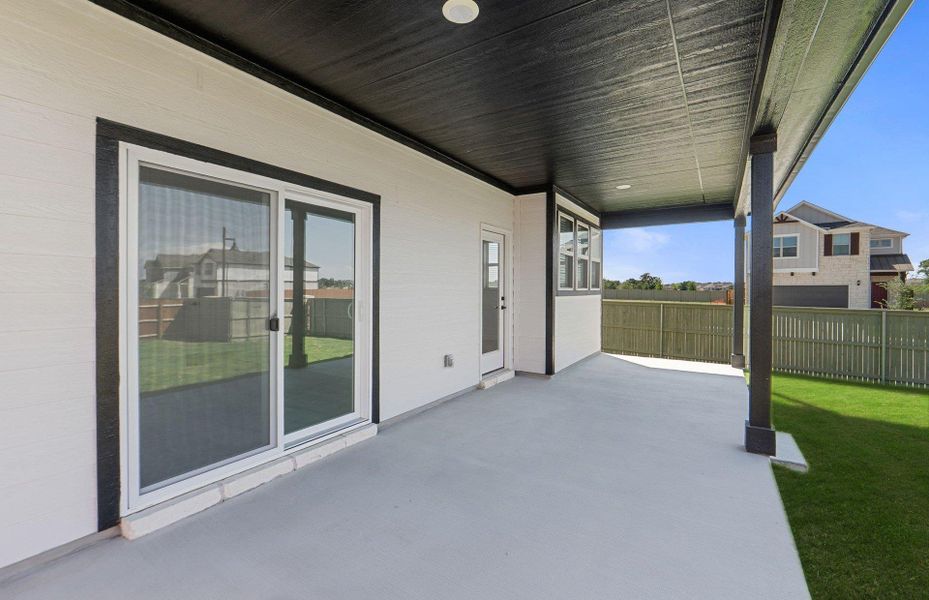 Exterior details and patio area of a home in Santa Rita Ranch, Liberty Hill (Image 20).