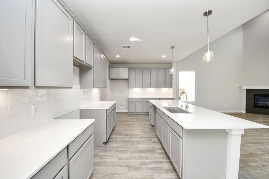 This kitchen is truly a chef's dream! Sample photo of completed home with similar floor plan. Actual colors and selections may vary. This kitchen is truly a chef's dream! Sample photo of completed home with similar floor plan. Actual colors and selections may vary.