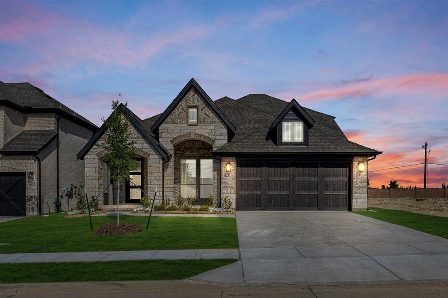 Front exterior of a new home in Devonshire, Forney, TX, highlighting curb appeal (Image 2).
