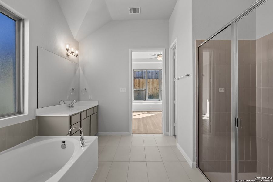 Furnished interior view inside a new home in Homestead 65', Schertz (Image 15).