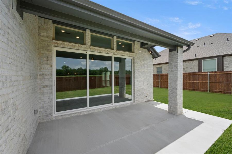 Exterior details and patio area of a home in Shady Valley Estates, Midlothian (Image 3).