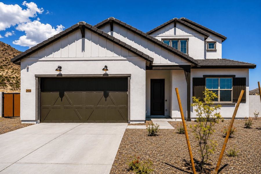Representative exterior photo of a completed home built from the Ponderosa by William Ryan Homes in The Ridge at Sienna Hills, Buckeye, AZ (Image 30). Representative exterior photo of a completed home built from the Ponderosa by William Ryan Homes in The Ridge at Sienna Hills, Buckeye, AZ (Image 30).