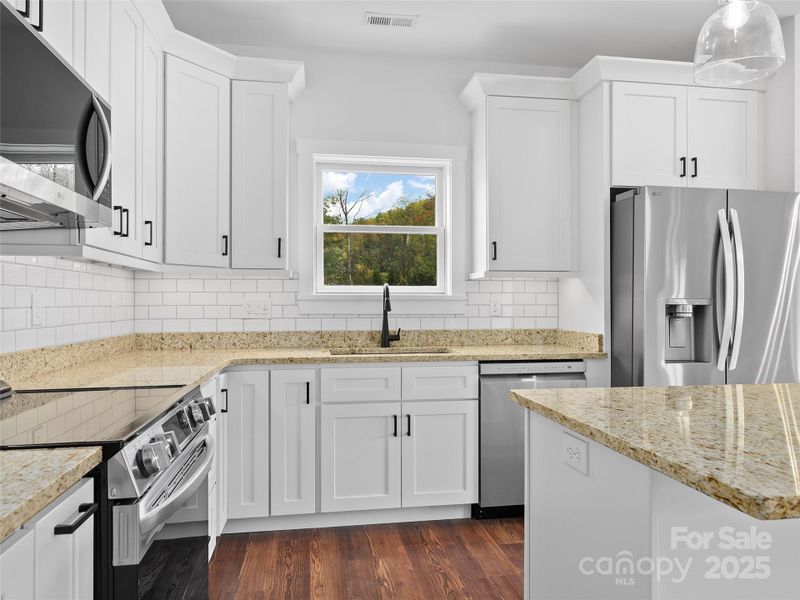 Furnished interior view inside a new home in , Waynesville (Image 5).