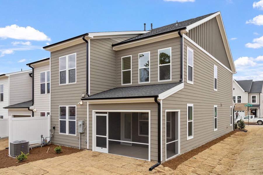 Exterior details and patio area of a home in Ovation at Sweetbrier, Durham (Image 22). Exterior details and patio area of a home in Ovation at Sweetbrier, Durham (Image 22).