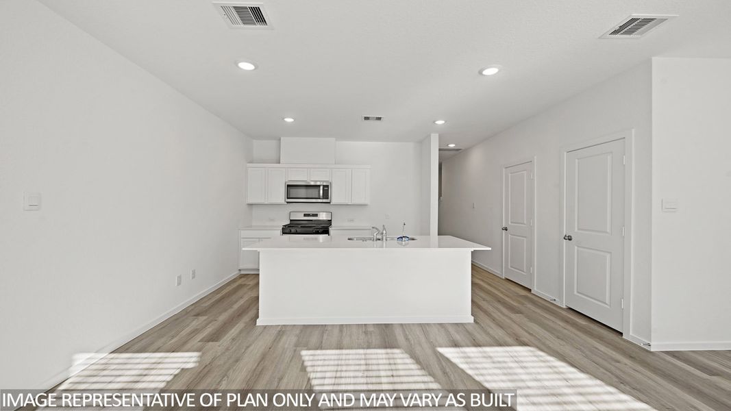 Furnished interior view inside a new home in The Villas at Legacy Park, Houston (Image 5). Furnished interior view inside a new home in The Villas at Legacy Park, Houston (Image 5).