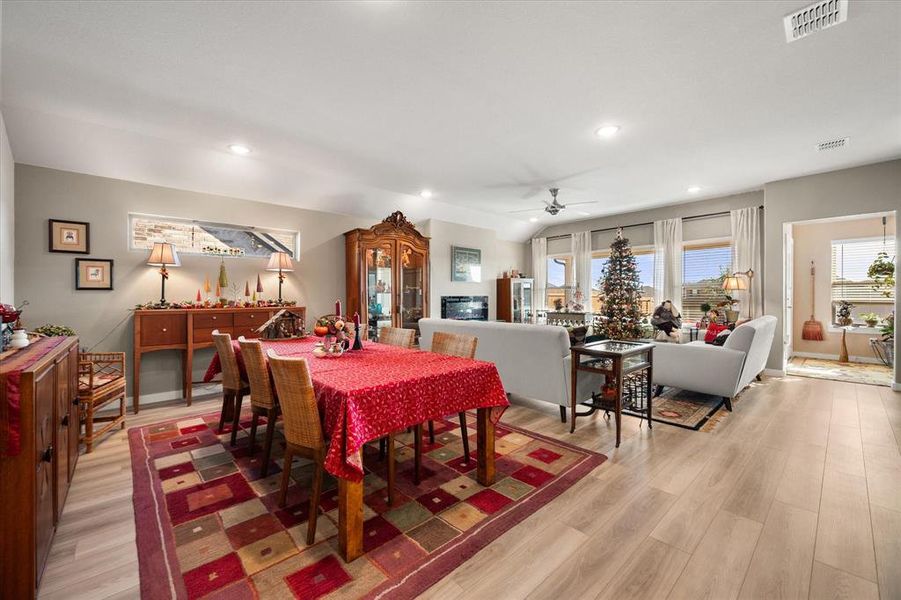 Dining space with light wood-style flooring, recessed lighting, and a ceiling fan Dining space with light wood-style flooring, recessed lighting, and a ceiling fan