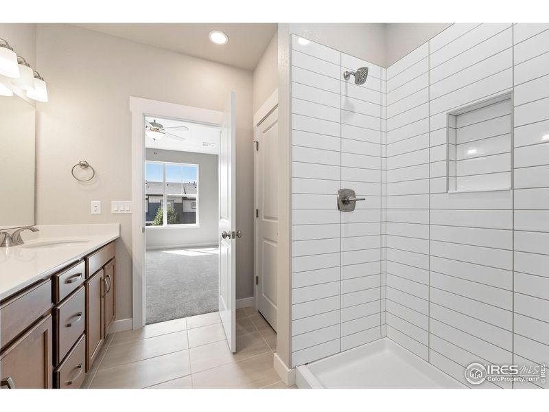 Furnished interior view inside a new home in The Lakes at Centerra - Discovery, Loveland (Image 12).